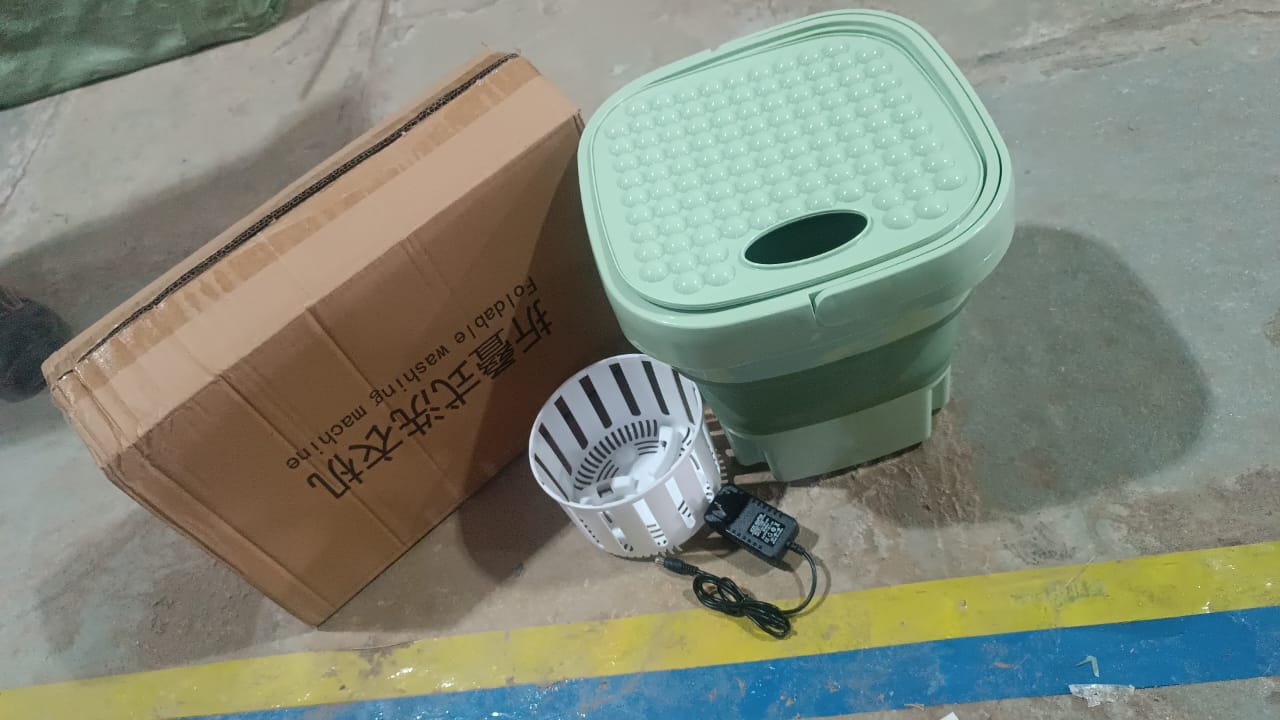 Foldable portable washing machine and dryer combo in mixed colors by Wukusy, suitable for compact home and kitchen use.