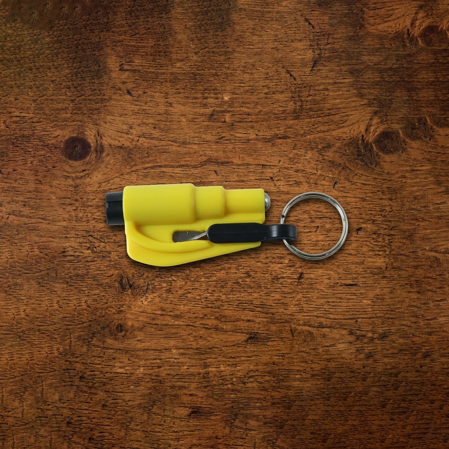 Wukusy keychain car safety hammer with window breaker and seat belt cutter attached to a keyring