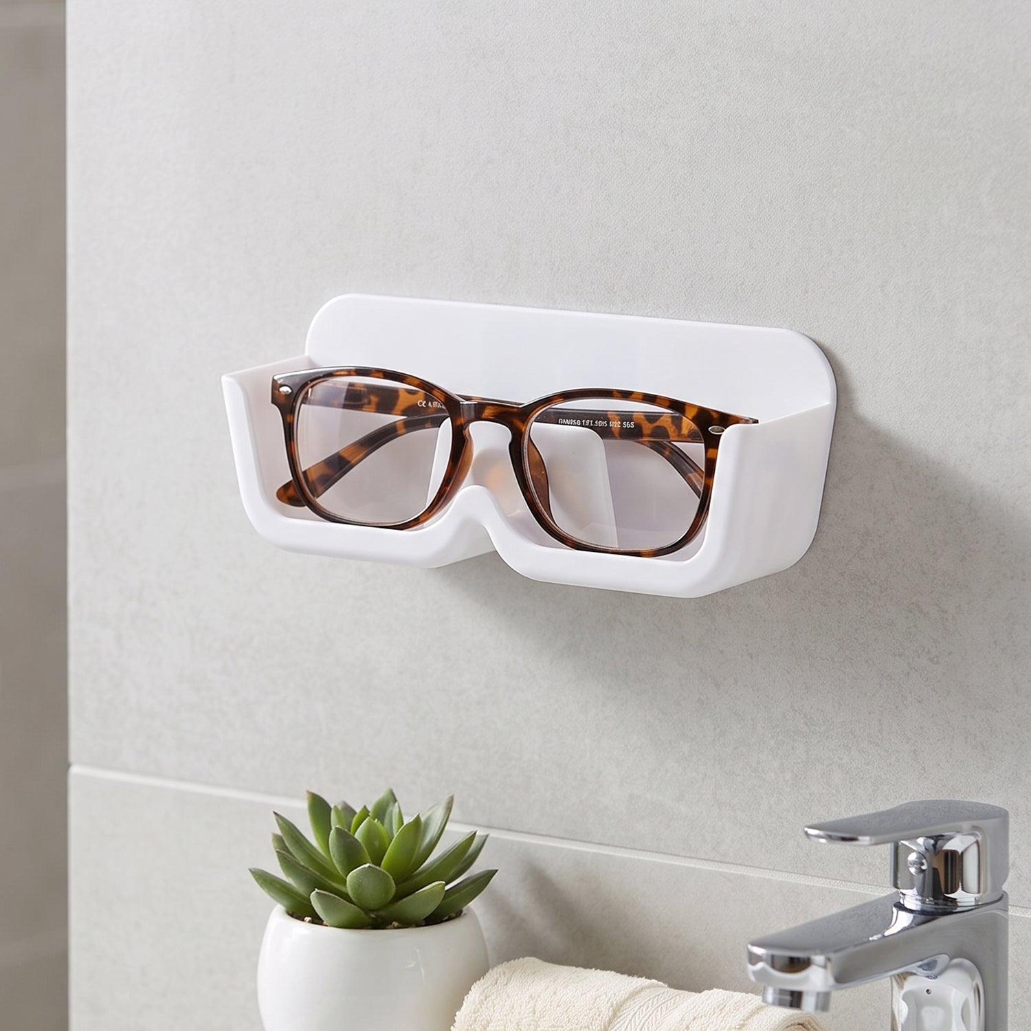 Wall-mounted Wukusy plastic sunglasses holder stand with adhesive, designed for eyewear organization and display.
