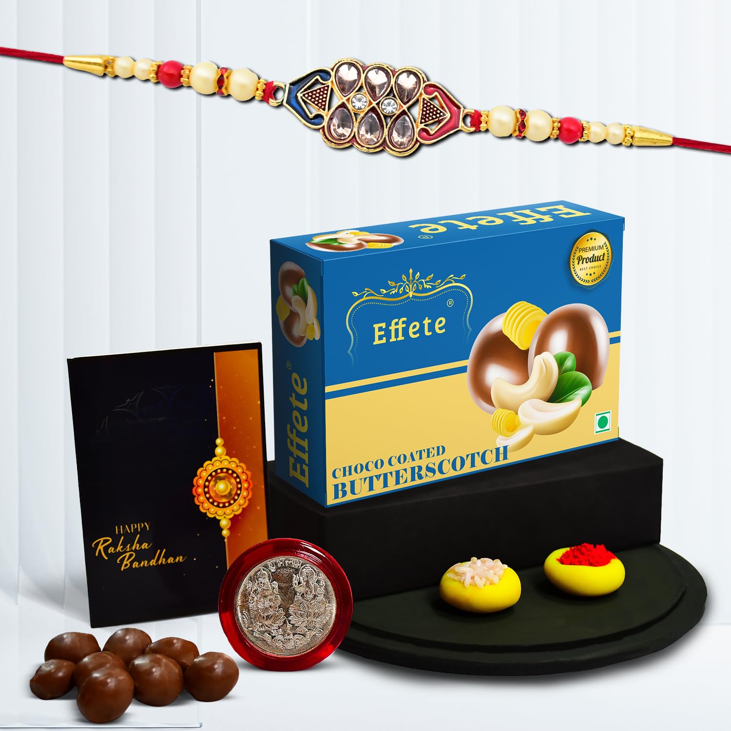 Wukusy Rakshabandhan floral design Rakhi with chocolate butter Scotch 32g for brother, featuring colorful floral patterns.