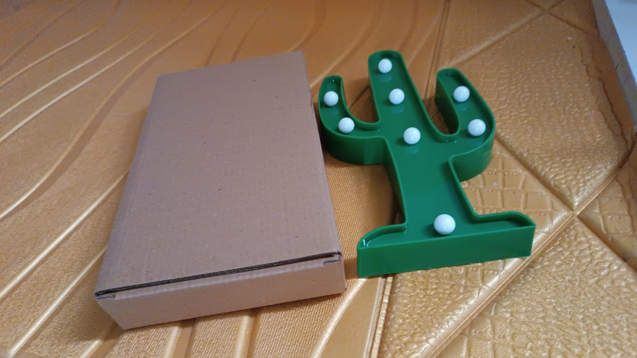 Wukusy LED cactus desk lamp for office, battery not included, with a bright LED light and cactus shape on a wooden desk.