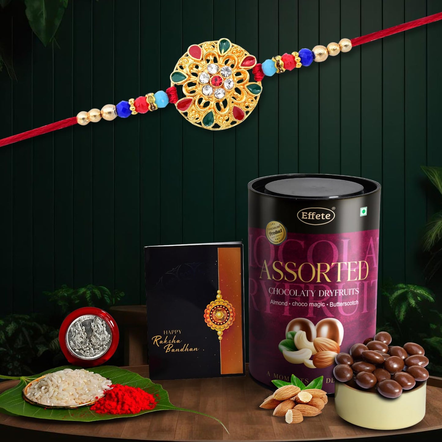 Stylish handmade Rakhi with assorted chocolates and dry fruits, perfect for brothers, featuring a decorative thread and gift set.