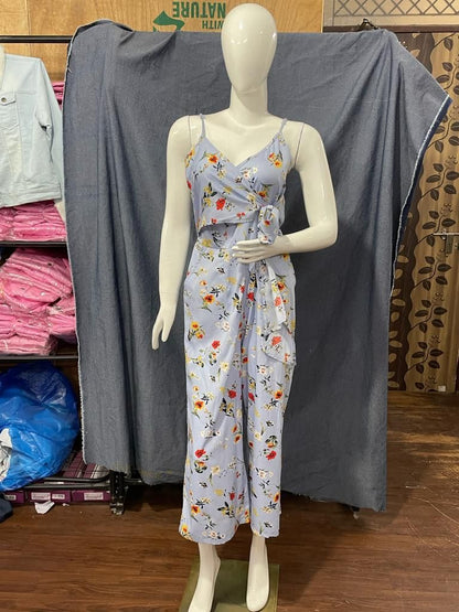 Floral print women's jumpsuit from Drpshippr's Men's Collection, featuring vibrant floral patterns and stylish design.
