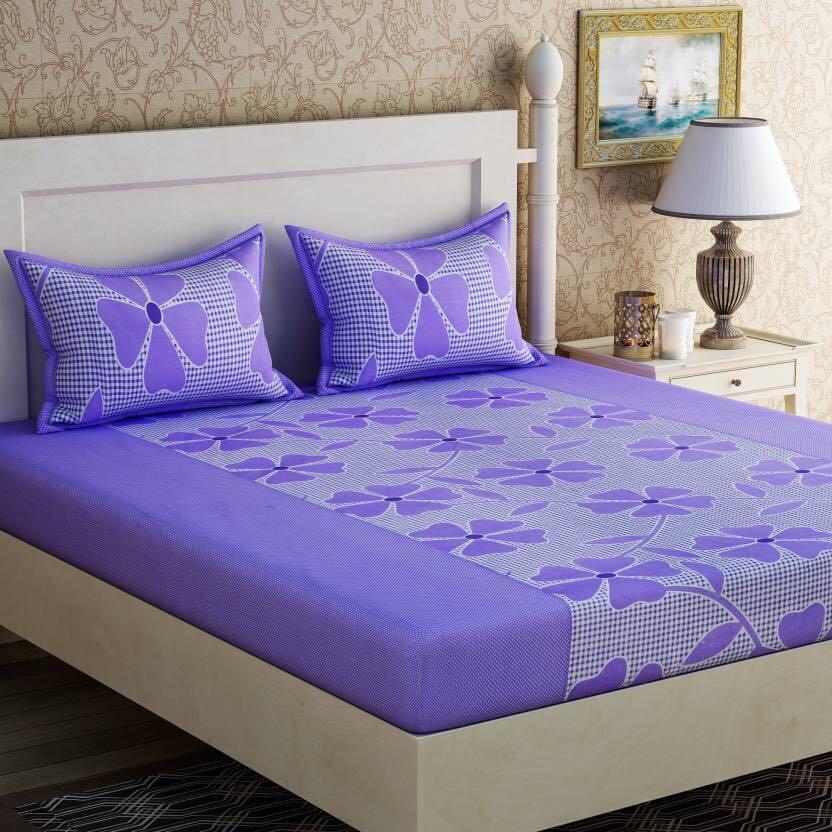 Floral printed cotton double bedsheet by Drpshippr featuring colorful flower patterns on soft white fabric.