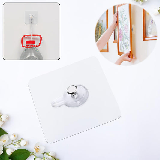 Wukusy multipurpose adhesive photo frame wall hook on a wall, damage-free and suitable for home and kitchen decor.