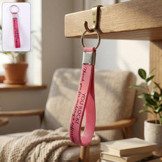 Wukusy motivational silicone wrist strap keychain in mixed colors, featuring inspiring text and durable silicone material.