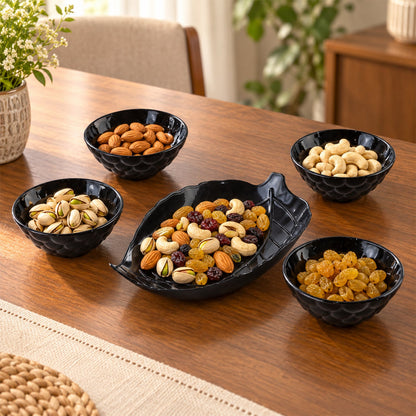 Wukusy 5-piece serving bowl set with leaf-shaped platter for snacks, dry fruits, and appetizers, arranged on a wooden table.