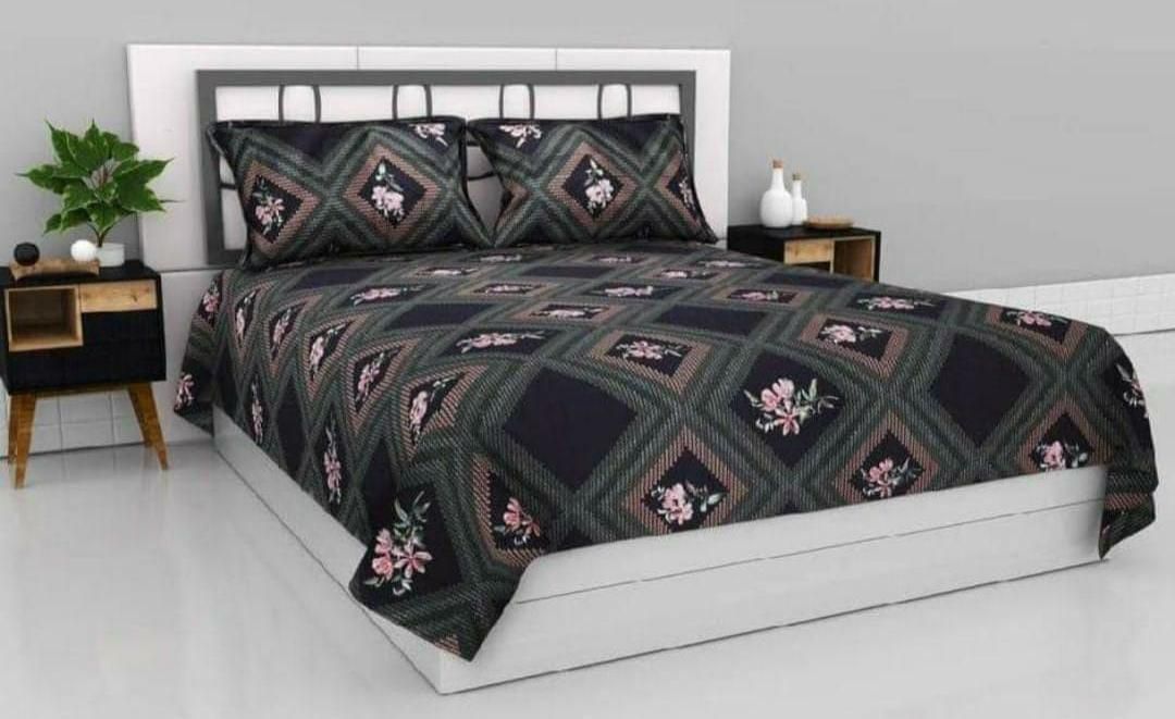 Glace cotton flat double bedsheet with two matching pillow covers, soft, lightweight bedding for home decor and comfort.