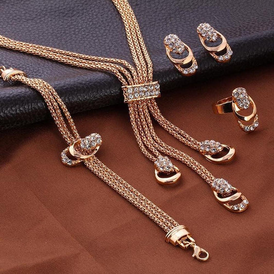 Glistening diamond jewelry set featuring a necklace, earrings, and bracelet with sparkling diamonds and elegant design.