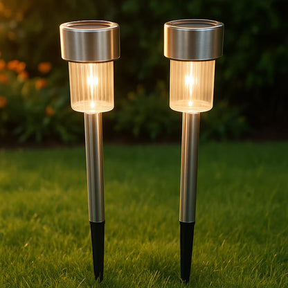 Set of 12 Wukusy solar garden lawn lamps illuminating outdoor space with modern, energy-efficient lighting.