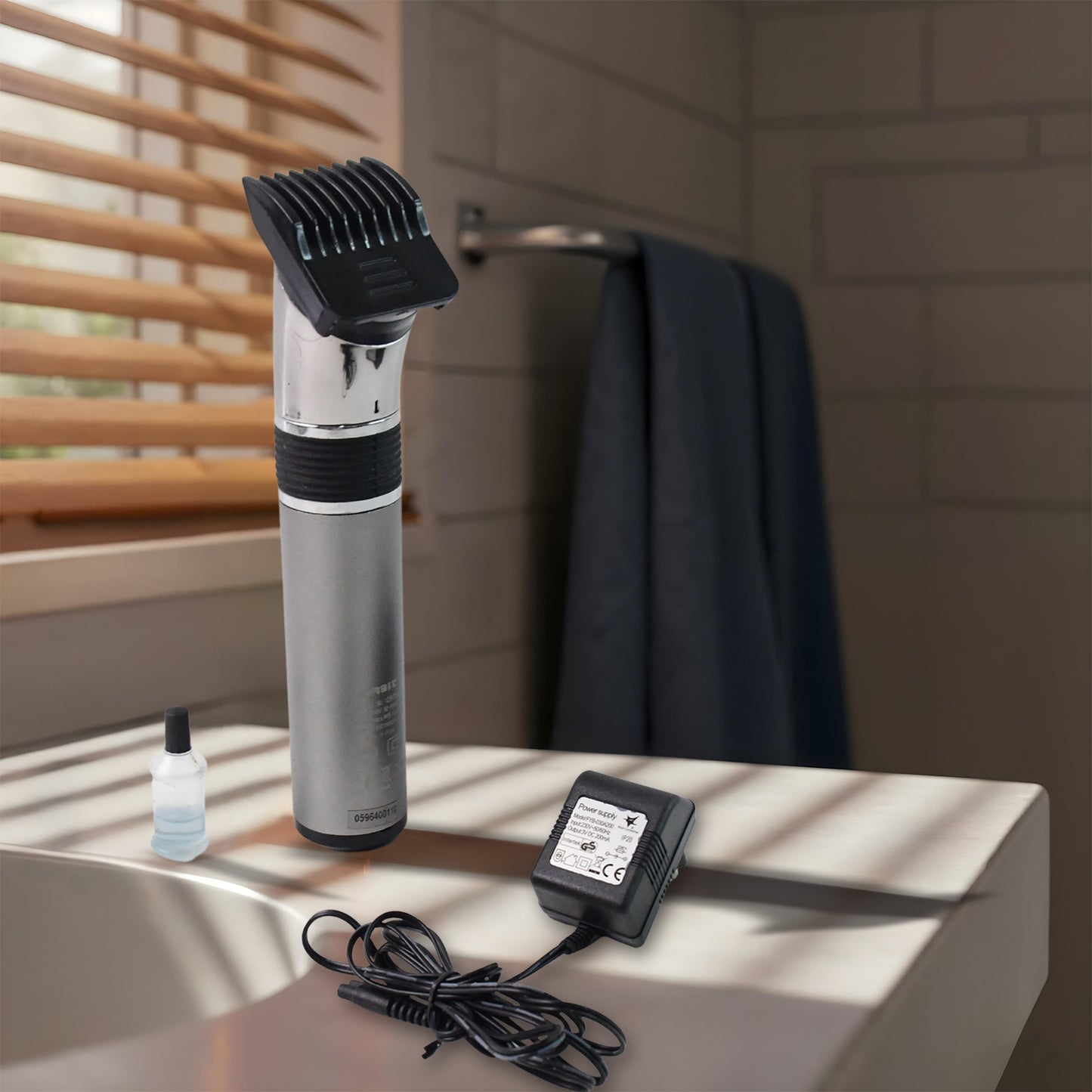 Wukusy Orbit rechargeable men's hair trimmer with ergonomic handle and adjustable blades, suitable for grooming and precise trimming.