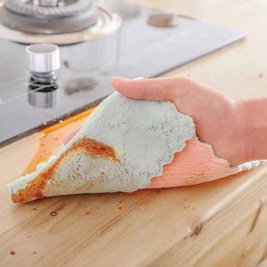 Wukusy 2503 multi-purpose kitchen wash towel hanging on a hook, showing its soft, absorbent fabric for cleaning and drying in the kitchen.