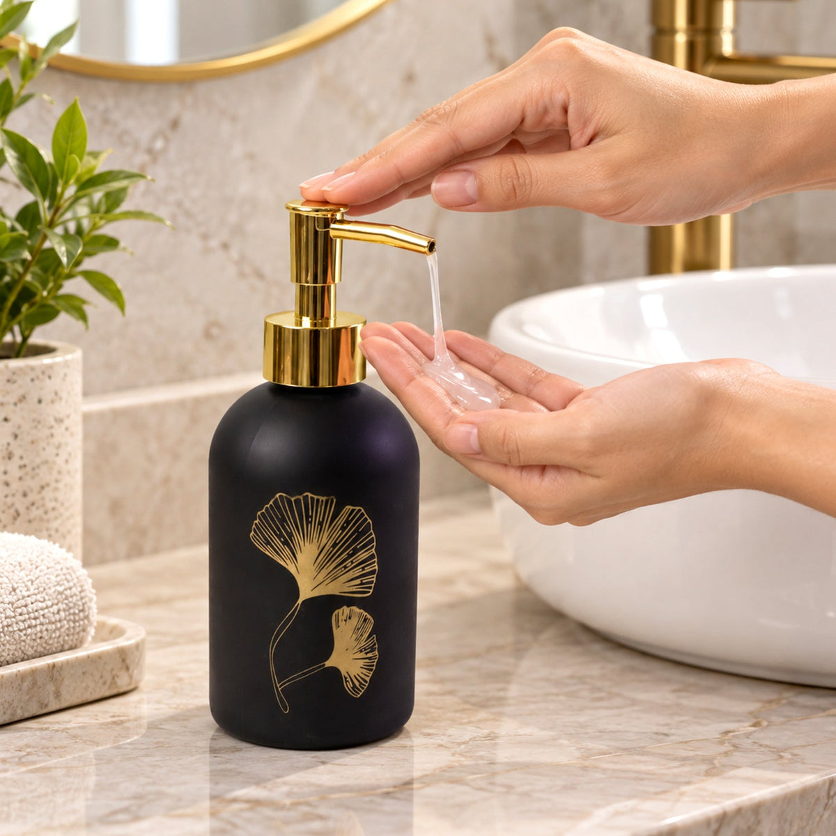 Wukusy manual liquid soap dispenser with leaf design and refillable pump bottle, featuring a sleek, elegant appearance.