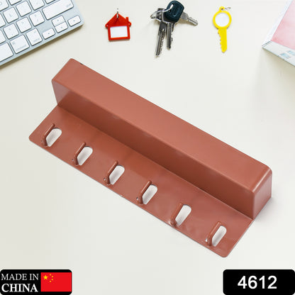 Wukusy 4612 key holder with six hooks on a stand, suitable for home or bathroom organization, made of durable metal.