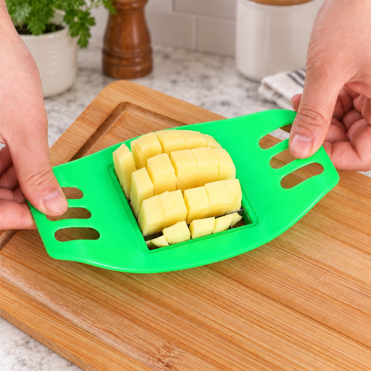 Wukusy French fry potato grid cutter with stainless steel blades, 17x10cm, showing the cutting grid and handle for making fries.