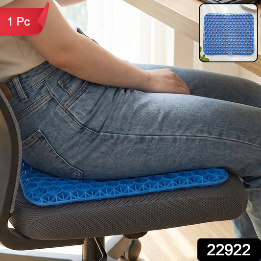 Wukusy honeycomb gel egg sitter cushion on an office chair, showing its ergonomic design for comfort at home or in the car