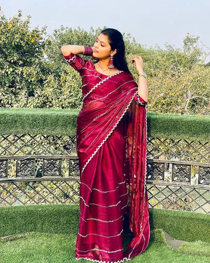 Elegant Jimmy Choo saree with intricate handwork from the Women's Collection, featuring detailed embroidery and luxurious fabric.