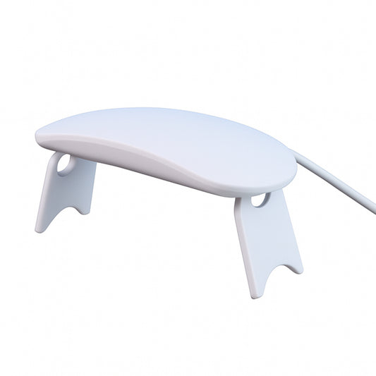 Wukusy mini portable UV LED nail lamp for gel nail polish curing, compact design with open top for easy gel application.