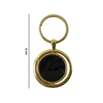 Gold plated keychain with rotating black round pendant from Wukusy, featuring a sleek and stylish design.