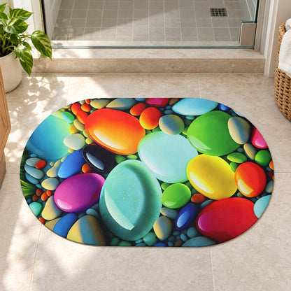 Colorful pebble print oval door mat by Wukusy, 57.5x38 cm, featuring vibrant pebble designs for home floor decor.