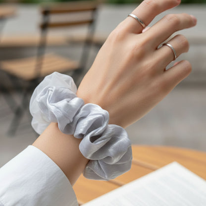 Wukusy dual-tone satin mesh fabric hair scrunchie, elegant and soft, shown wrapped around a bundle of hair.