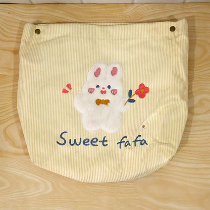 Foldable fabric storage basket by Wukusy with snap closure, ideal for toys, clothes, and home organization.
