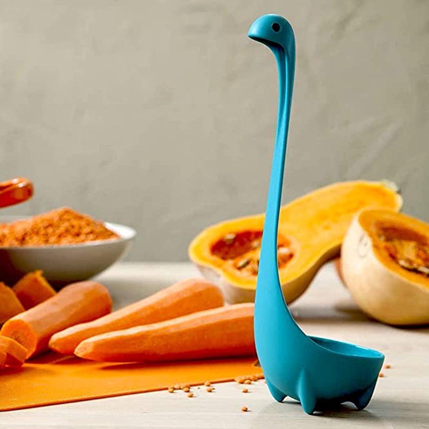 Wukusy Loch Ness Monster soup spoon with long handle and standing design, ideal for kitchen cooking and serving.