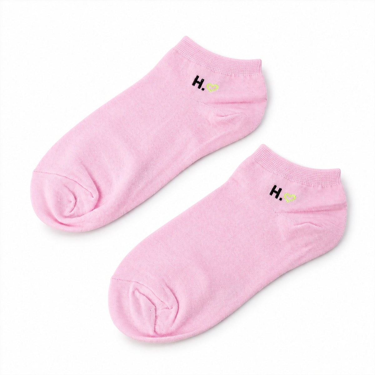 Pair of soft, stretchable low cut ankle socks for women by Wukusy, no show design, ideal for sports and casual wear.