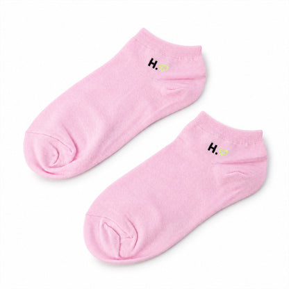 Pair of soft, stretchable low cut ankle socks for women by Wukusy, no show design, ideal for sports and casual wear.