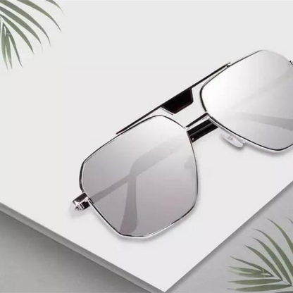 Silver trendy sunglasses inspired by modern fashion, featuring sleek design and reflective lenses, by Drpshippr.