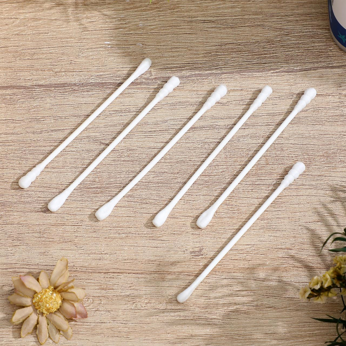 Box of Wukusy premium ultra-soft baby cotton swabs with 200 pieces, featuring gentle cotton tips and plastic sticks for delicate use.