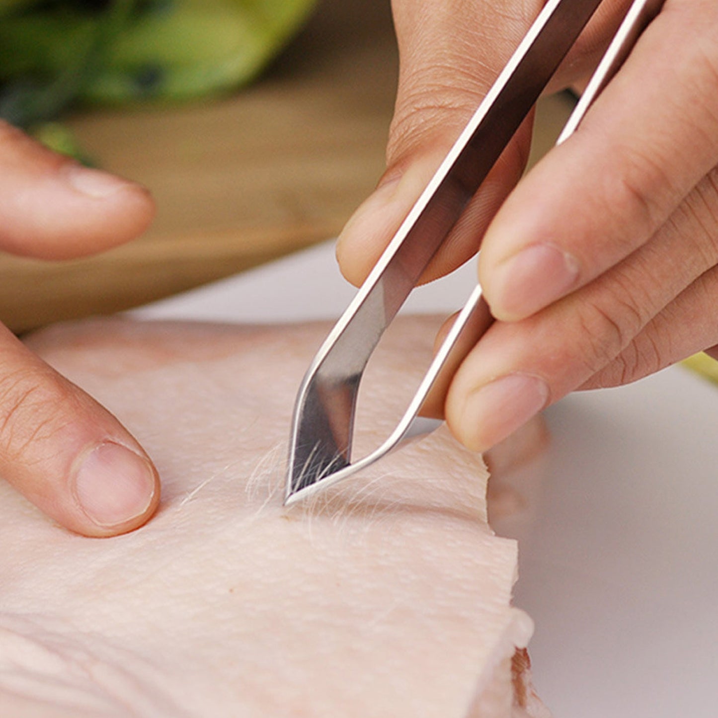Stainless steel fish bone tweezer by Wukusy, with precision tips for removing fish bones easily and safely.