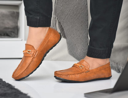 Leather men's loafer shoes from Drpshippr's collection, featuring classic slip-on design and stylish detailing.