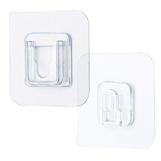 Wukusy 7433 transparent adhesive male hook for hanging items, shown attached to a wall in a home improvement setting