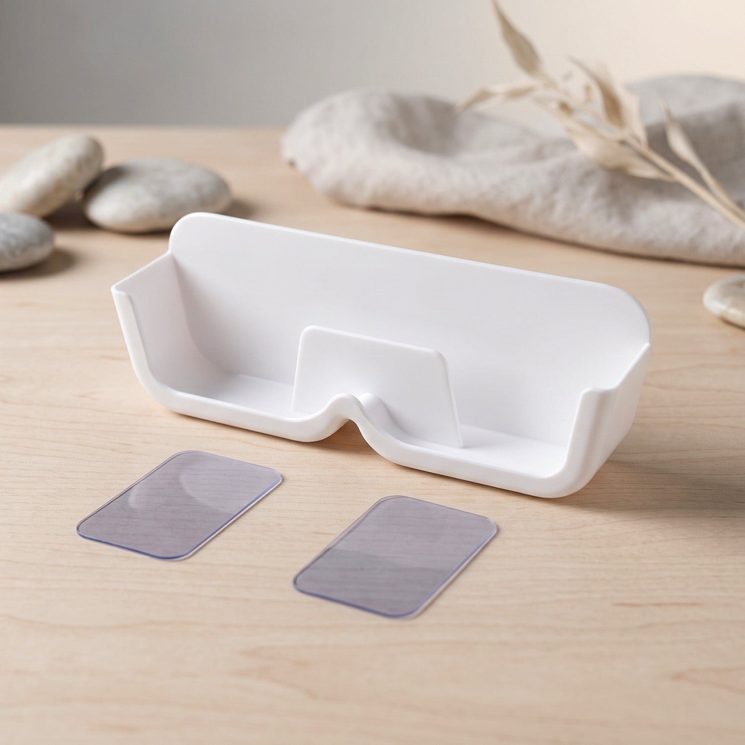 Wall-mounted Wukusy plastic sunglasses holder stand with adhesive, designed to organize eyewear neatly on the wall.