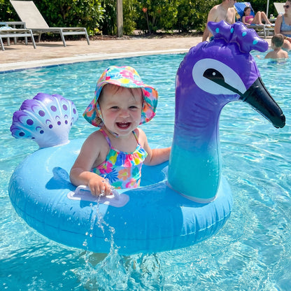 Colorful inflatable kids swim ring by Wukusy, designed for comfortable floating and safety during swimming activities.