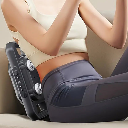 Wukusy handheld full body massage gun with four massage heads for muscle relaxation and pain relief in a health and beauty setting