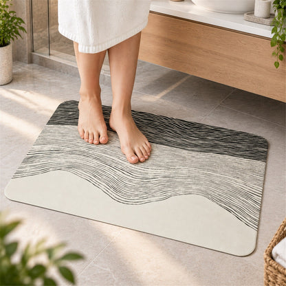 Wukusy absorbent bathroom mat with abstract wave line print, quick-drying 60x40 cm bath rug for bathroom flooring.