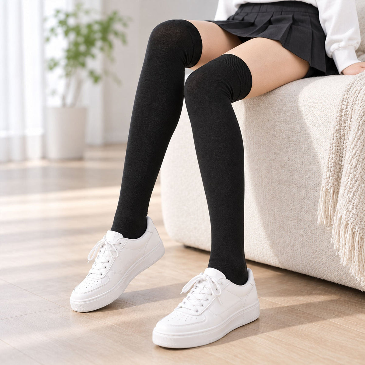 Two pairs of Wukusy long soft stretchable over-the-knee socks in neutral and pastel colors, ideal for casual everyday wear.