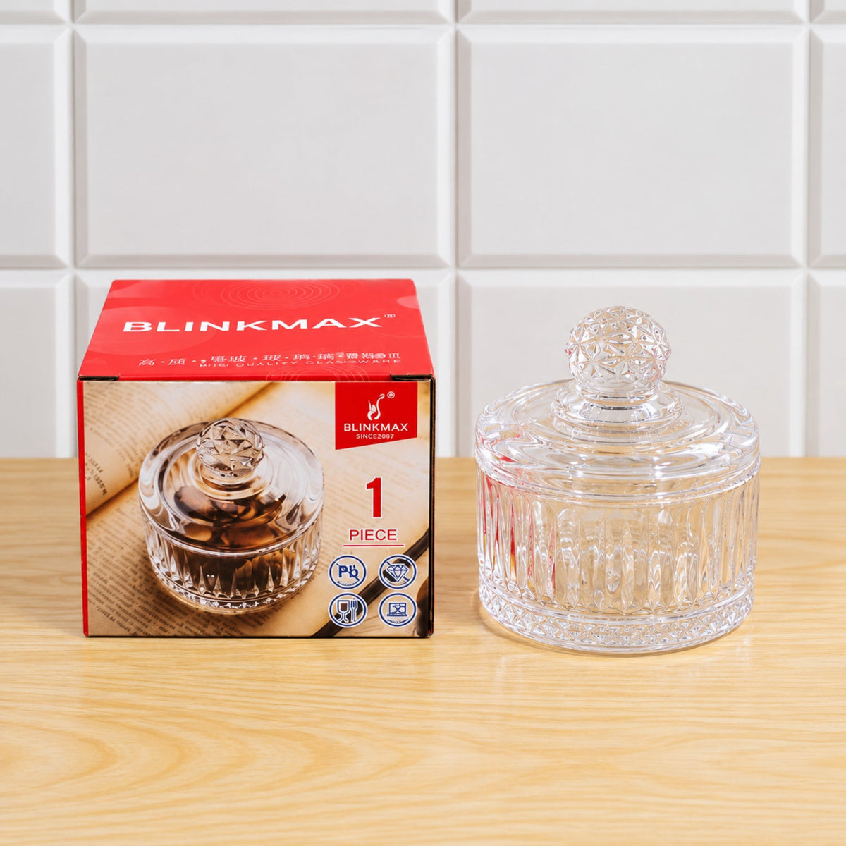 Clear ribbed glass candy bowl with lid by Wukusy, perfect for sweets and table display, showcasing its elegant design.