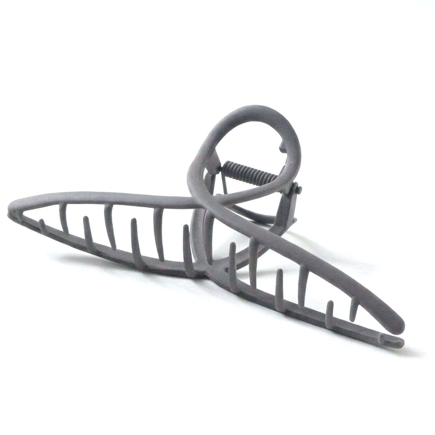 Wukusy strong grip large hair claw clip holding a section of hair, showcasing its durable design and wide opening.