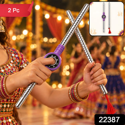 Pair of Wukusy steel dandiya sticks with textured grip, bearing center, and tassels for traditional dance performances.