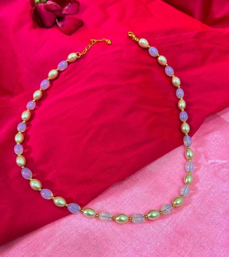 Drpshippr PD Enterprise Mala necklace featuring gold plating and pearl accents on a delicate chain.
