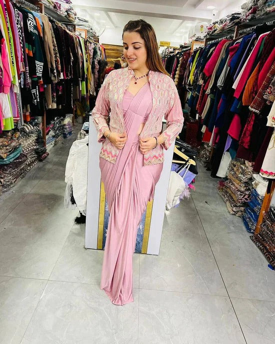Pink Mulmul silk saree with intricate embroidery and sequence work from Drpshippr's Women's Collection, showcasing elegant traditional design.