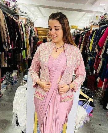 Pink Mulmul silk saree with intricate embroidery and sequined work from Drpshippr Women's Collection, showcasing elegant traditional design.