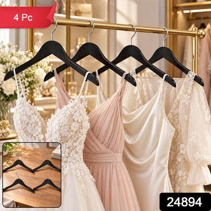 Set of four Wukusy premium clothes hangers with metal hooks, ideal for wardrobe storage and organization.