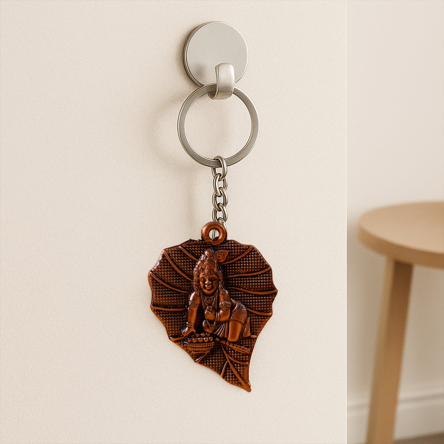 Antique-finish metal keychain from Wukusy featuring a decorative design, single piece with detailed craftsmanship.