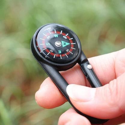 Mini Wukusy clip snap hook with built-in compass, versatile and compact for outdoor gear or keychain attachment.