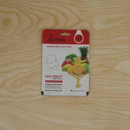 Wukusy mix fruit facial sheet mask with niacinamide for hydrating skin, shown on a skincare display with fresh fruit slices