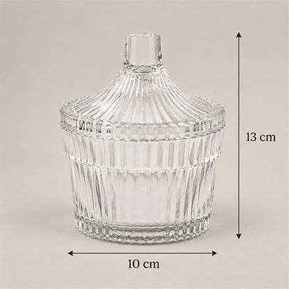Wukusy crystal clear candy jar with lid, ribbed design, ideal for storing dry fruits and sweets, transparent and decorative.